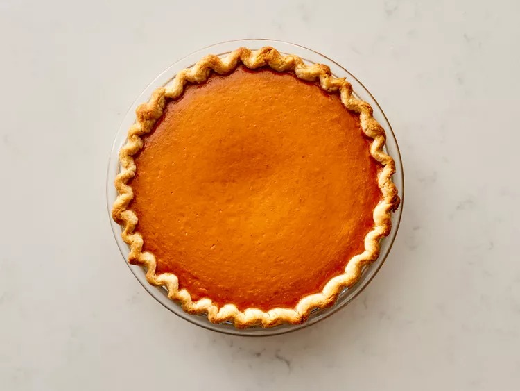 Into the oven it goes. I bake it until a knife poked about an inch from the edge comes out clean. This usually takes between 40 and 60 minutes. If the crust edges start getting too dark, I loosely cover them with foil and keep going.