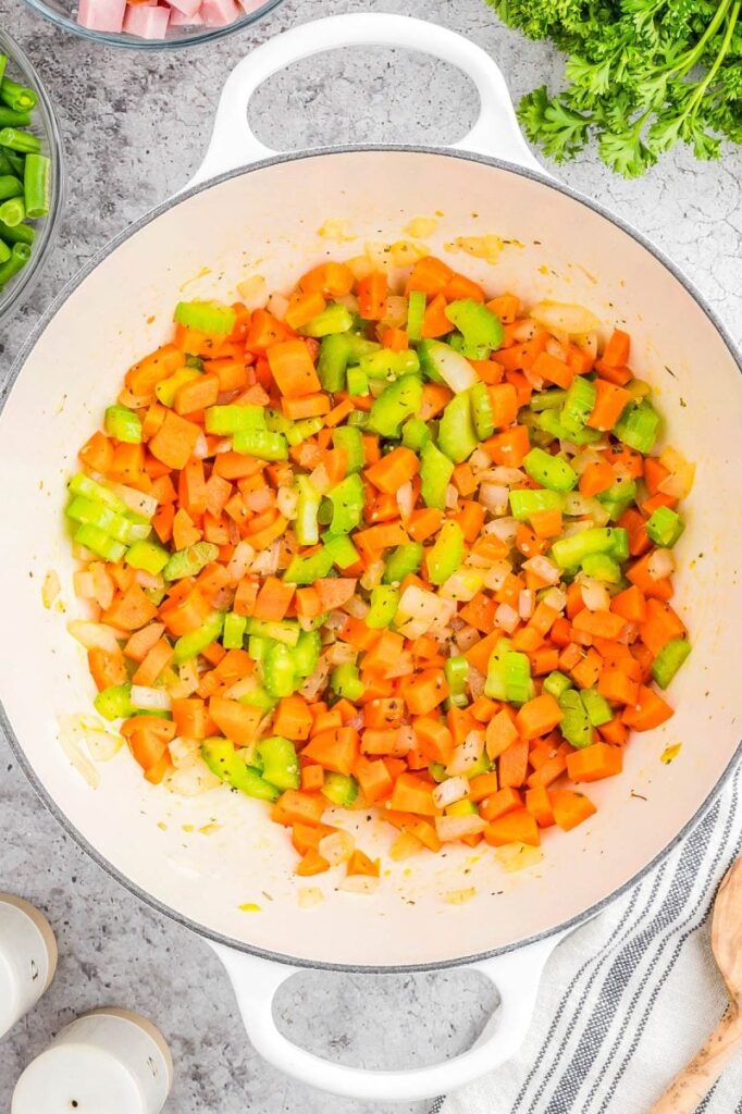 Add the carrots, celery, Italian seasoning, salt, and pepper. Cook another 4 to 5 minutes until the vegetables are starting to get tender and smell really good.