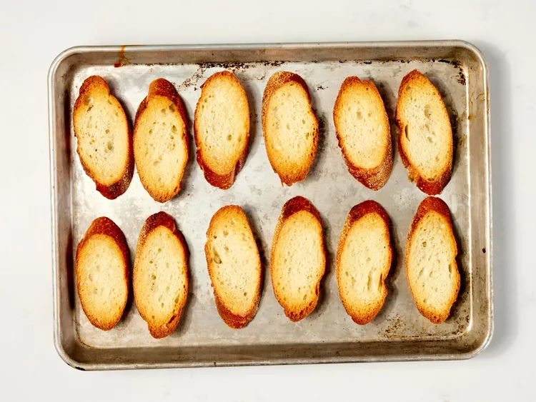 Toast sliced bread until golden and crisp