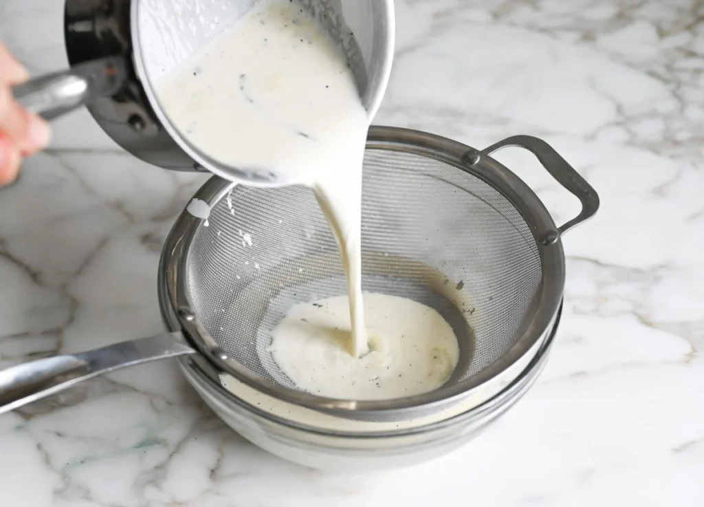 Strain the cream if using a vanilla pod. 