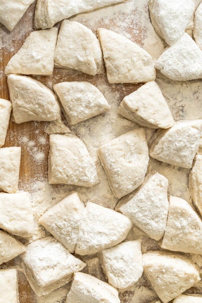 Don’t skip tossing the raw biscuits in flour