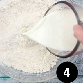 Pour in the milk and gently knead it into a dough ball