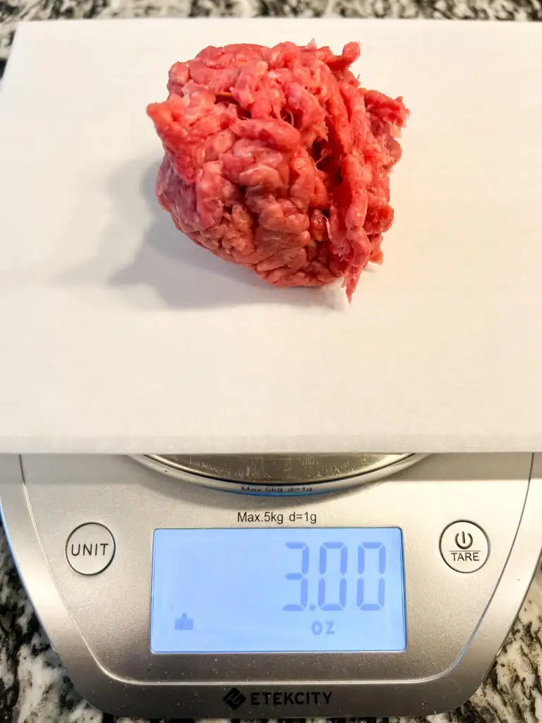 Roll the ground beef into two 3-ounce balls