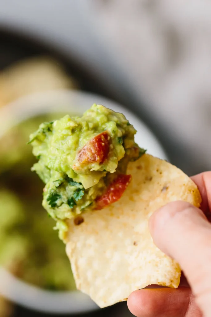 Serve right away with tortilla chips, or honestly, whatever you have nearby