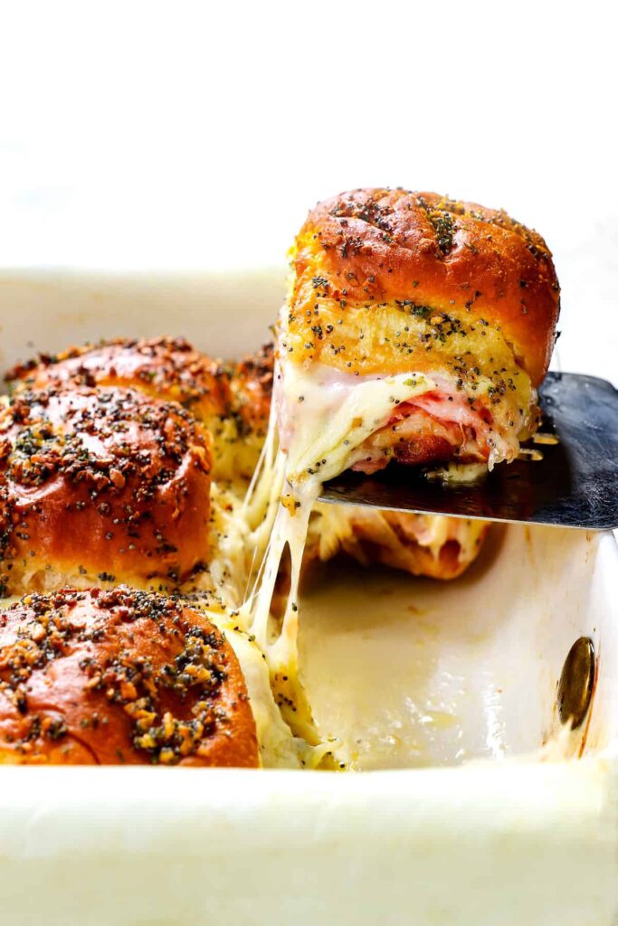 Slice into individual sliders and serve warm