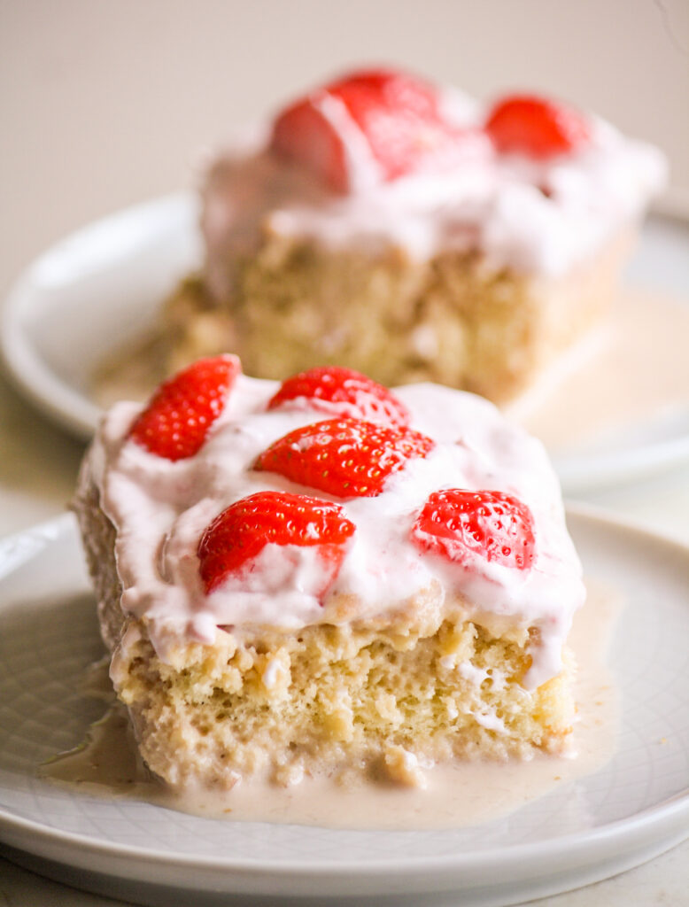 Top with whipped topping and fresh strawberry slices just before serving