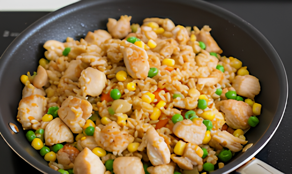 Toss and flip the rice so it absorbs the soy sauce evenly (1)