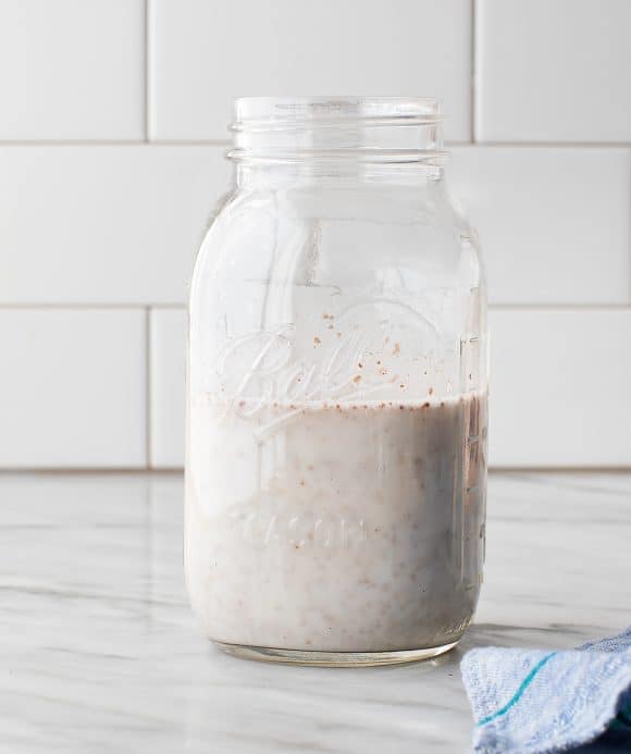 In a jar with a lid, combine the almond milk, chia seeds, maple syrup, and cinnamon