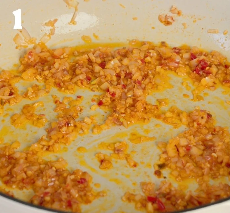 Once hot, add the optional Calabrian chili paste, diced shallots, garlic, and paprika