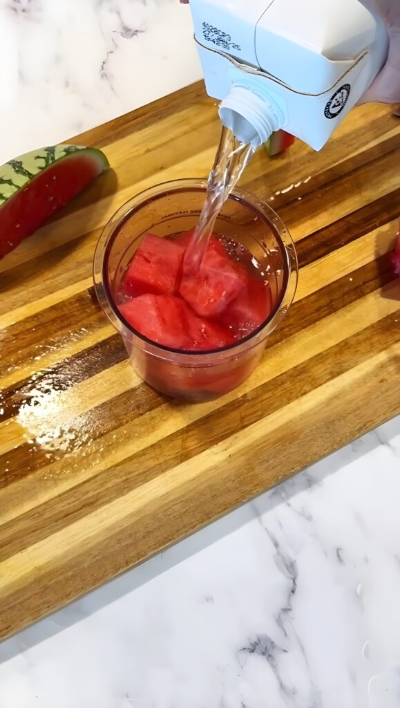 Pour coconut water into the container until it reaches the max fill line