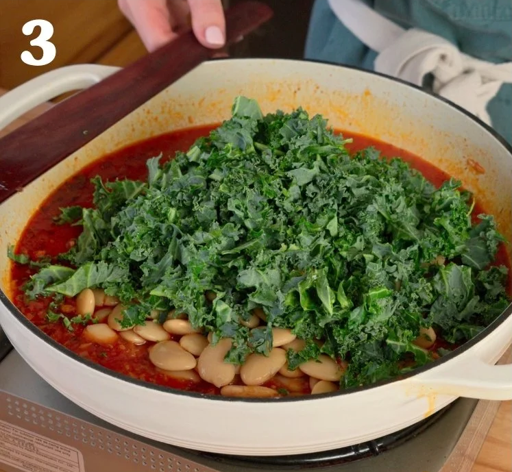 Pour in the vegetable broth and stir in the Italian seasoning, butter beans, and kale. Bring the mixture to a gentle simmer.