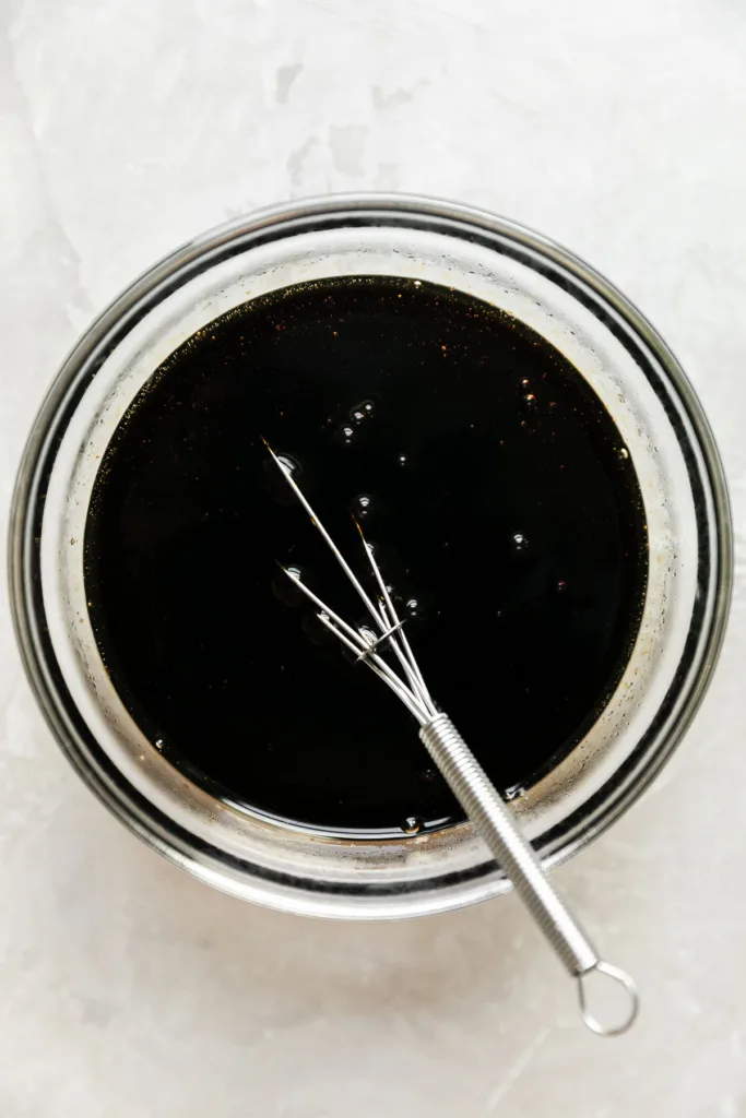 Prepare the teriyaki sauce by whisking together brown sugar, soy sauce, mirin, and sesame oil in a small bowl