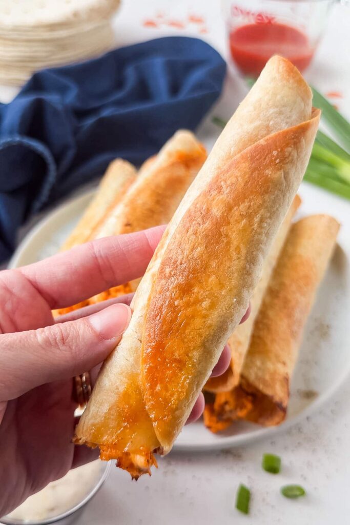 Serve warm drizzled with extra buffalo sauce, topped with sliced green onions, and with ranch or blue cheese dressing on the side