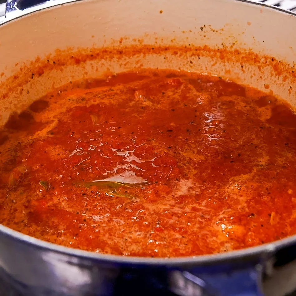 Pour in the blended tomato-pepper mixture and cook over medium heat for 10 to 12 minutes, or until the mixture reduces by about half.