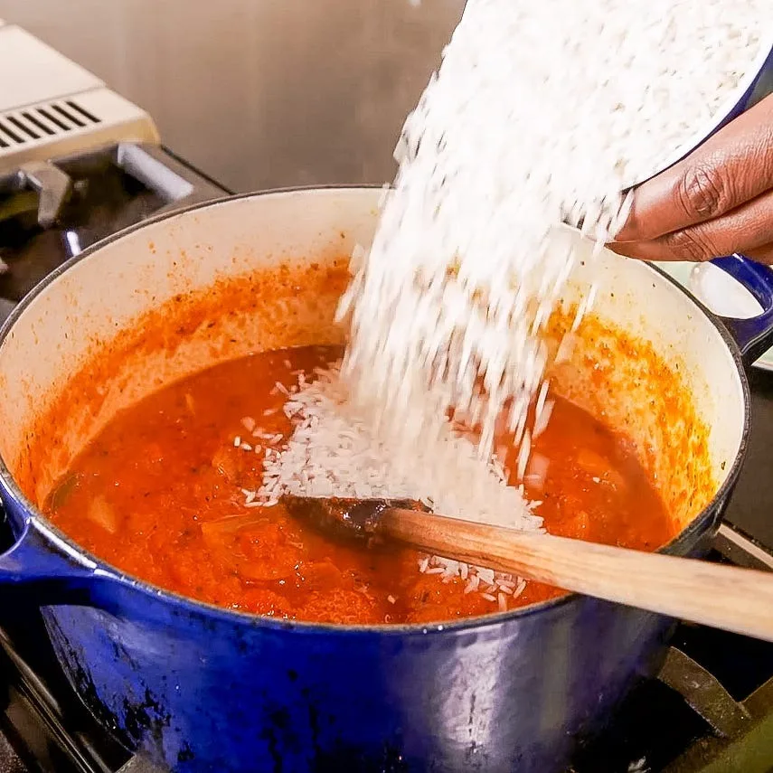 Stir in the rinsed rice and butter. Adjust salt to taste.