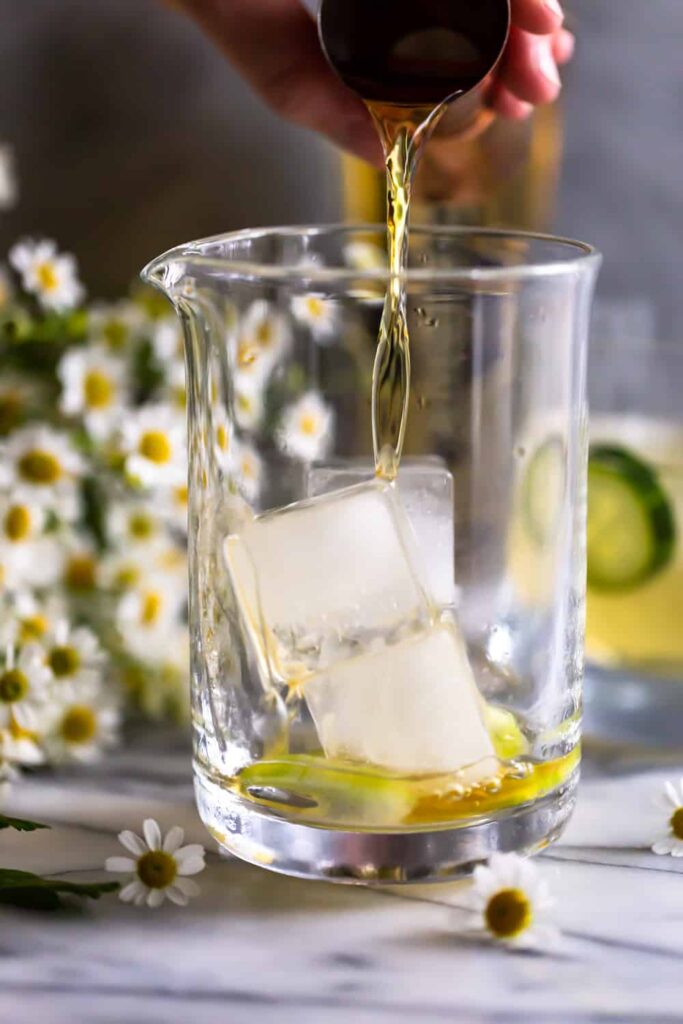 Add Irish whiskey, St. Germain elderflower liqueur, simple syrup, lemon juice, and ice to the shaker