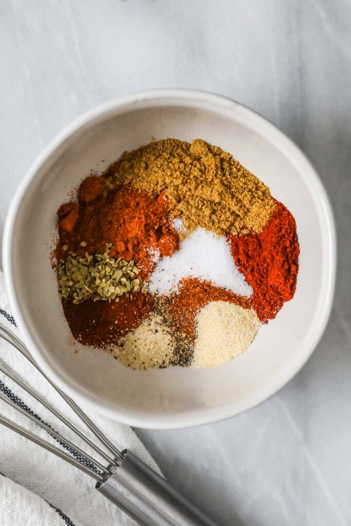 Add all the spices to a small bowl