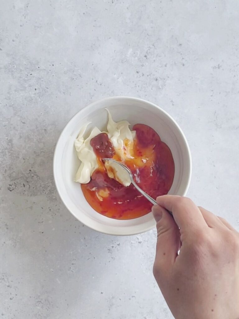 Add the mayonnaise, Thai sweet chili sauce, and sriracha to a small bowl