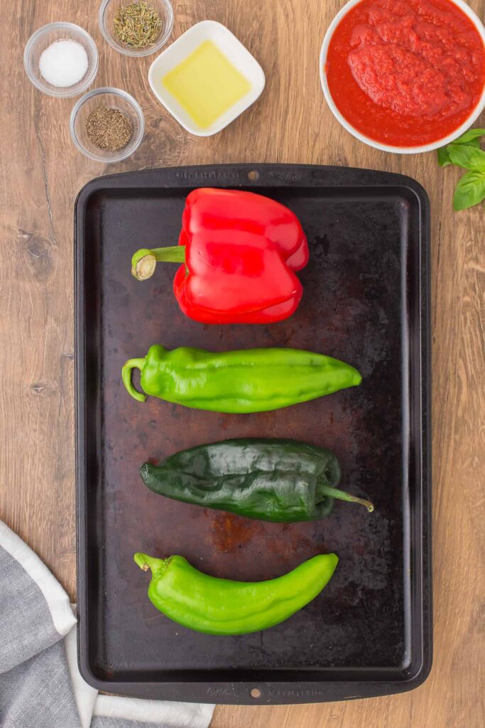 Char the peppers under a broiler or on a grill until blackened on all sides