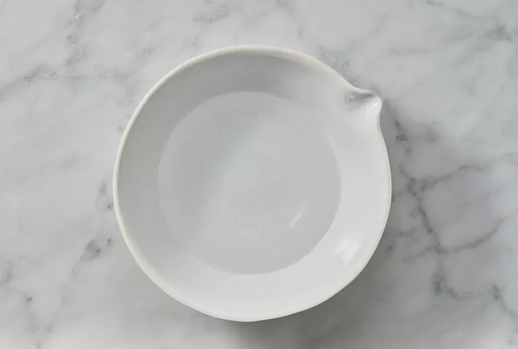 Combine the cold water and vodka in a small bowl, then place the mixture in the refrigerator so it becomes evenly chilled