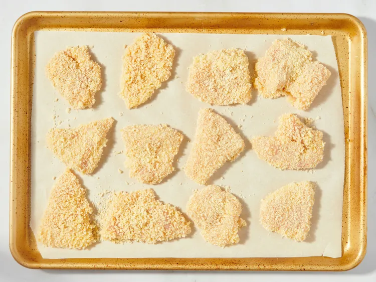Dip each piece of chicken into the egg mixture, then coat in the seasoned flour. Return it to the egg mixture and finally coat thoroughly with panko