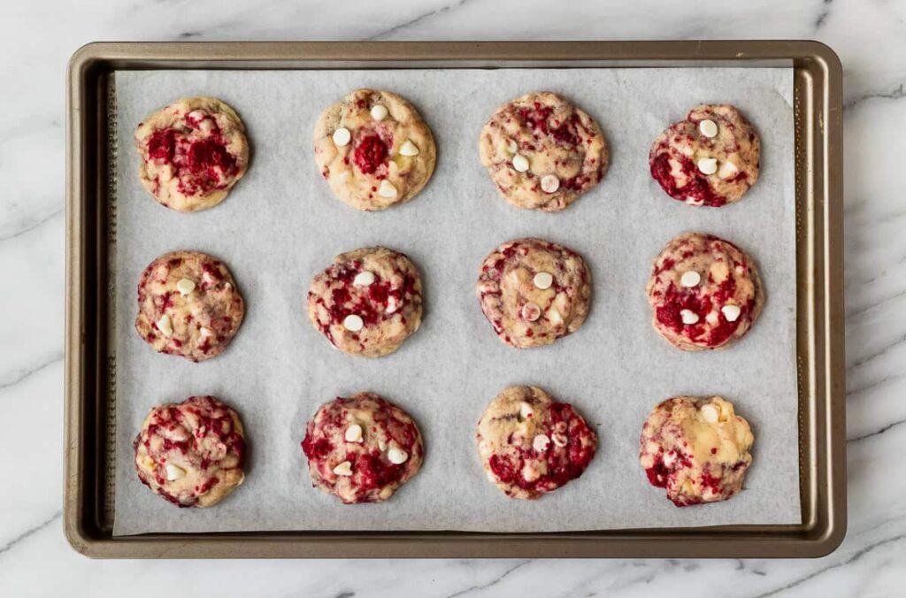 Flatten each dough ball slightly
