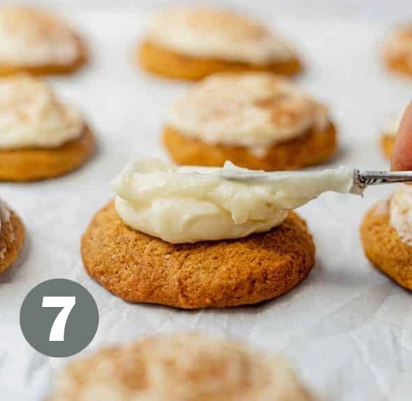 Frost the cooled cookies generously