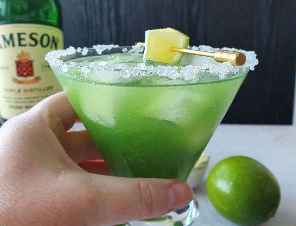 Garnish with a lime wedge and serve immediately
