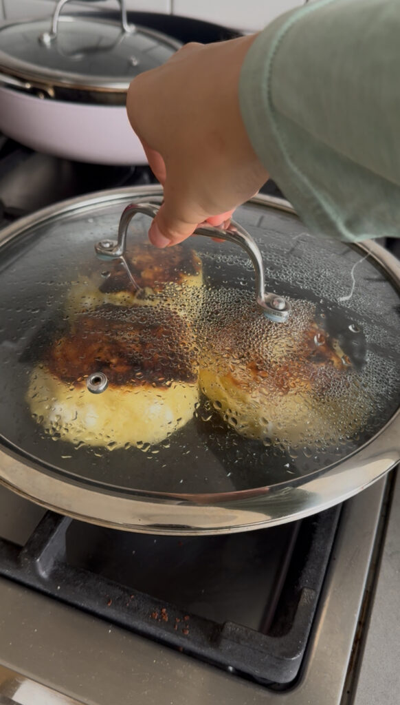 If the center still looks slightly raw, add 1–2 teaspoons of water to the pan and quickly cover with a lid. Cook another 1–2 minutes until the pancakes puff up and cook through