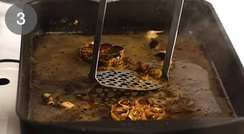 Mash the roasted garlic into the gravy, then simmer until it thickens slightly