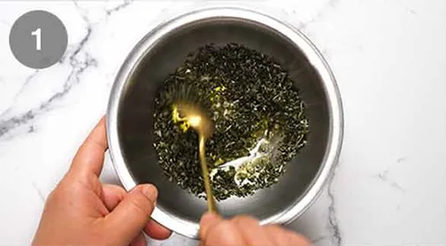 Mix rosemary, garlic, and olive oil to form the rub