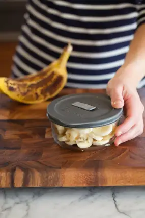 Place the banana pieces into an airtight container or freezer-safe bag