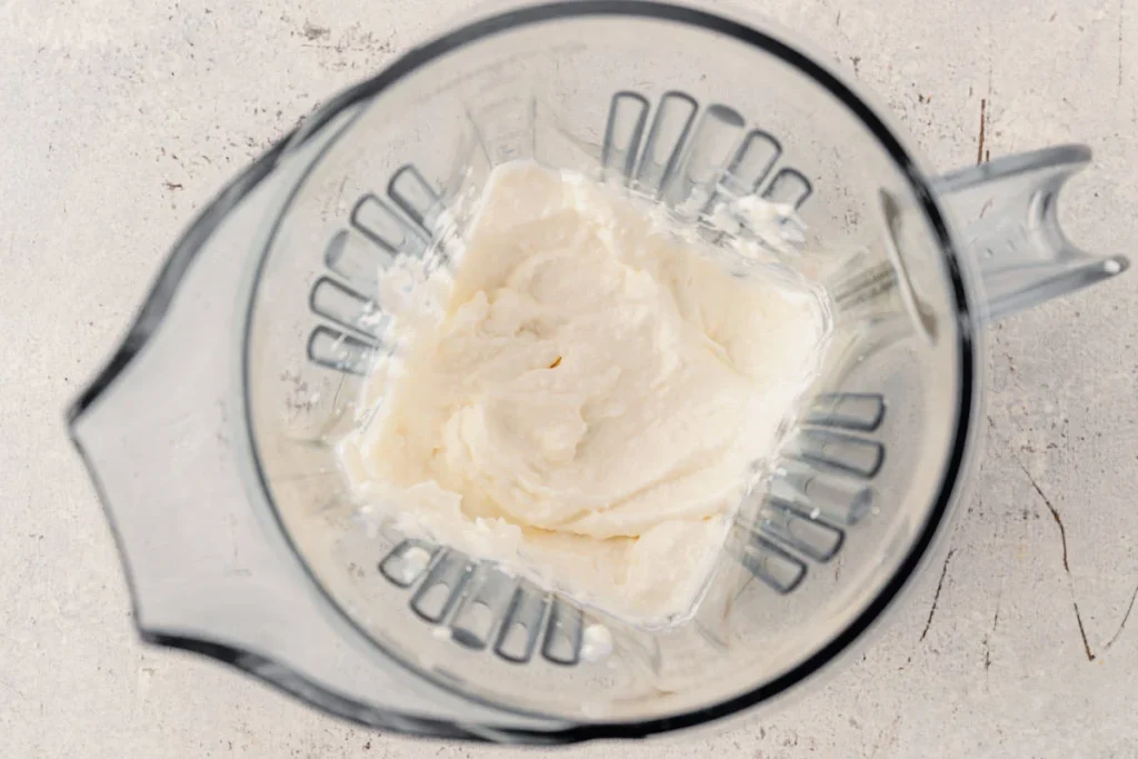 Place the cottage cheese in a food processor or blender and blend until completely smooth, scraping down the sides as needed