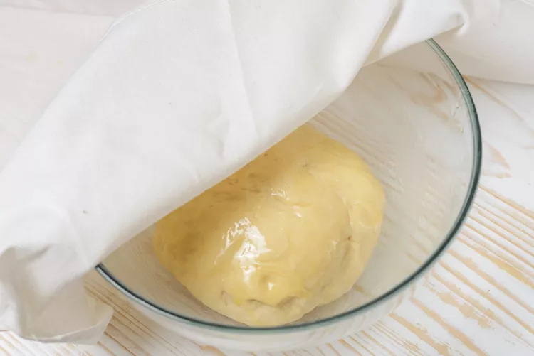 Place the dough in a greased bowl, cover, and allow it to rise until doubled in size
