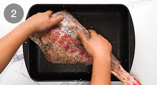 Place the lamb in a roasting pan and coat it evenly with the rub. Sprinkle with salt and pepper