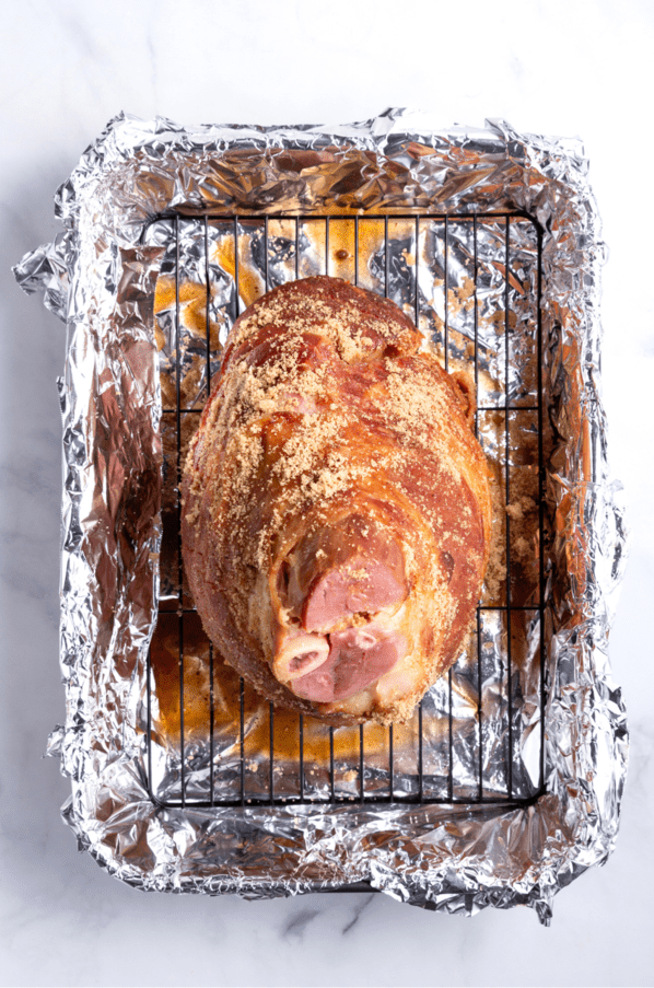 Place under the broiler until the coating becomes golden and bubbly