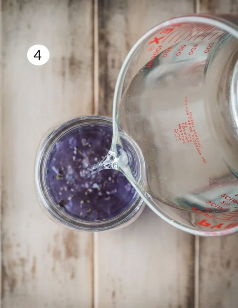 Pour the strained syrup into a large pitcher or jar. Add the freshly squeezed lemon juice and cold water, then stir thoroughly until everything is well combined