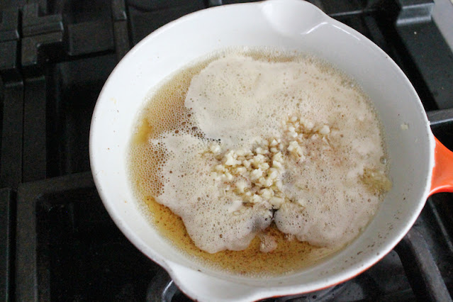 Remove the butter from heat and stir in the minced garlic so it gently infuses without burning