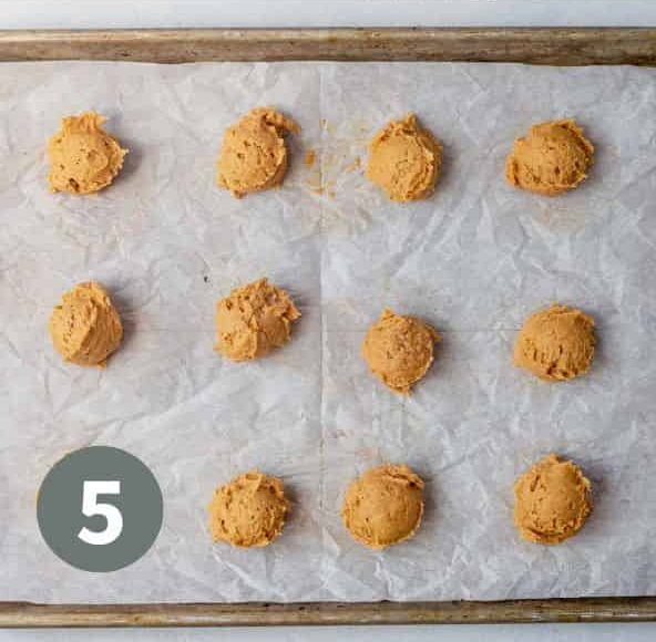 Scoop heaping tablespoons of dough onto the prepared baking sheet, spacing them a few inches apart. Bake for 10 to 12 minutes, or until the tops are set and no longer look wet
