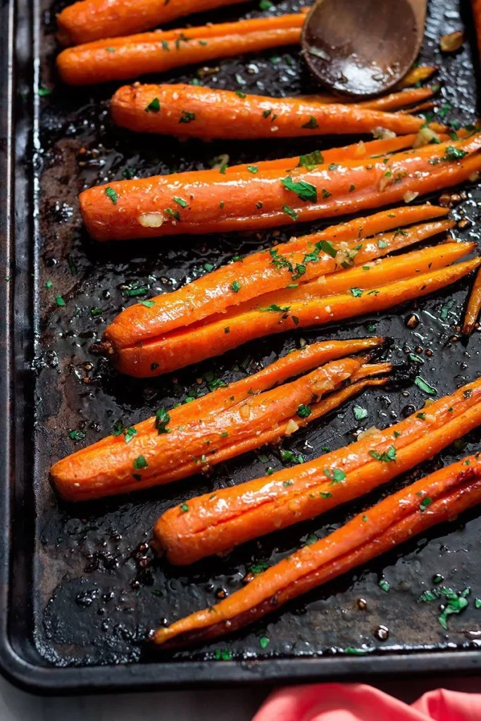Season with salt and pepper, ensuring the carrots are evenly coated