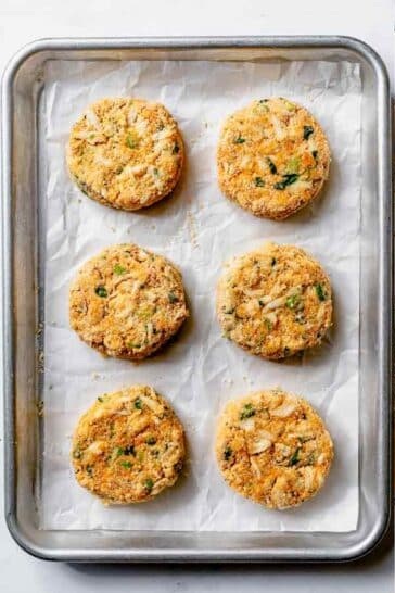 Shape the mixture into 6 equal patties, about ½ cup each. Crush the remaining ½ cup panko into a finer crumb and gently dredge the patties to coat. Cover and refrigerate for at least 30 minutes, or up to overnight, to firm up