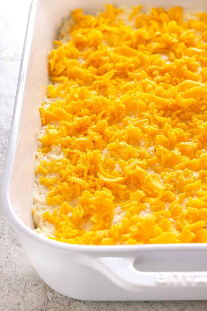 Sprinkle the remaining shredded cheese evenly over the top to create a golden, bubbly crust