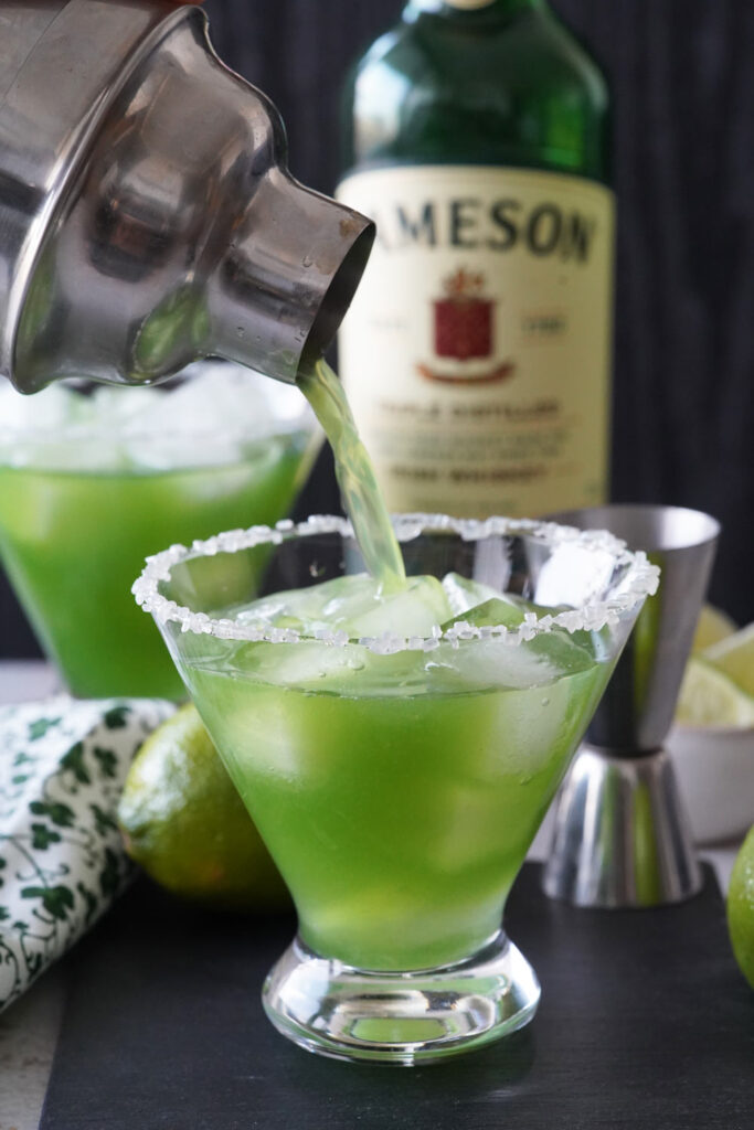 Strain the cocktail into the prepared glass