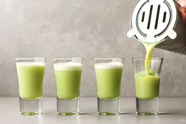 Strain the mixture into shot glasses