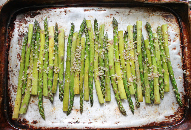 Take the asparagus out of the oven and switch the oven to broil on high