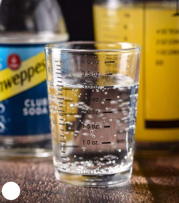 Top each glass with club soda, leaving a little room at the top for garnish