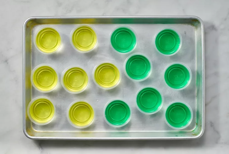 Transfer the filled cups to the refrigerator and chill until completely firm, allowing sufficient time for the gelatin to set fully before serving