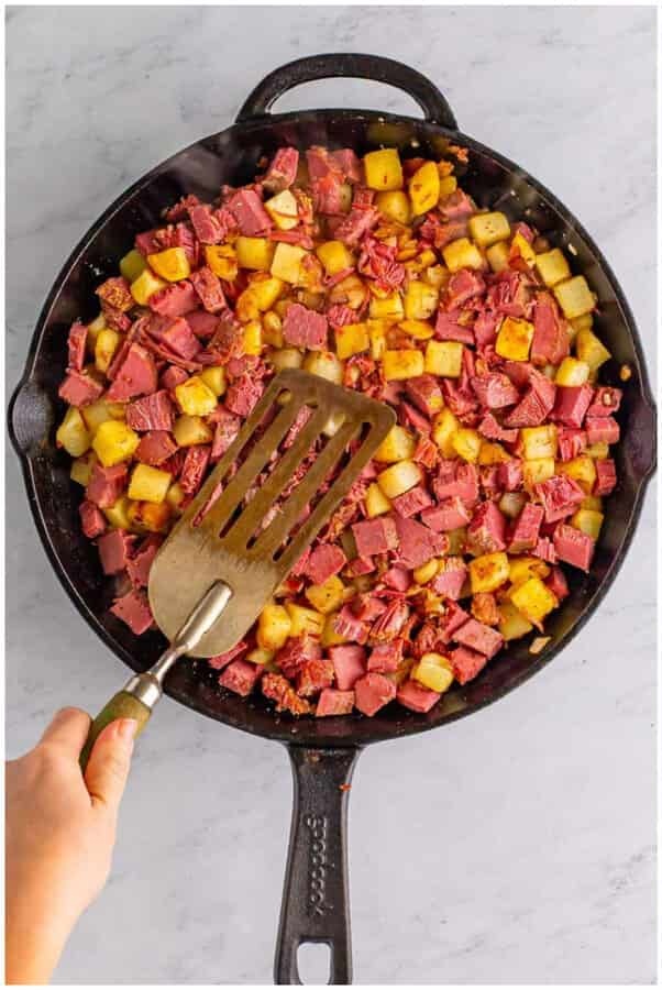 Use the back of a spatula to press the mixture into a flat, compact layer