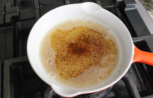 While the asparagus cooks, melt the butter in a small saucepan over medium heat, stirring constantly until it turns golden with browned bits forming at the bottom