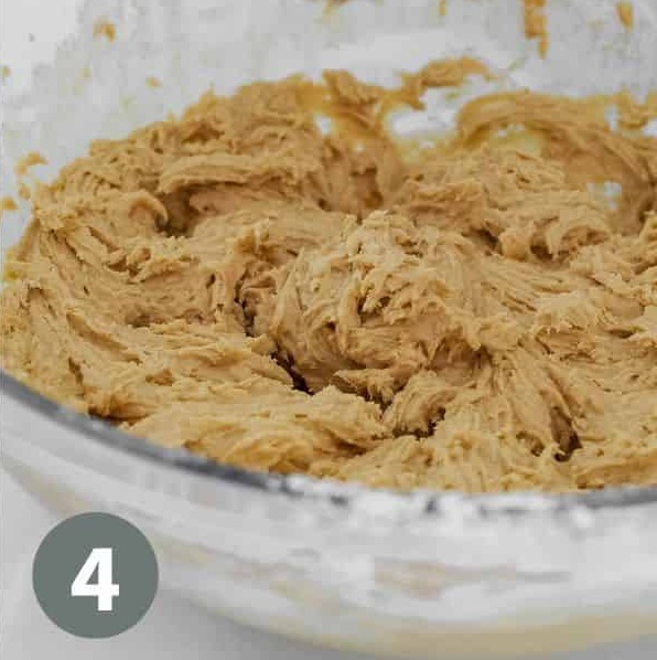 With the mixer on low speed, gradually add the flour. Increase speed slightly and mix until fully incorporated. The dough will be soft and slightly wet
